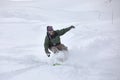 Snowboarding in fresh powder snow