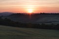 Val d`Orcia or Valdorcia landscape in Tuscany at sunset, a very popular travel destination in Italy Royalty Free Stock Photo