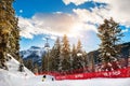 Skiers skiing down the slope in Val Di Fassa ski resort, Italy Royalty Free Stock Photo