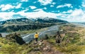 Valahnukur viewpoint with female hiker standing on peak in icelandic highlands at Thorsmork, Iceland