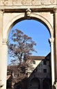 The valaresso arch of Padua frames the homonymous courtyard.