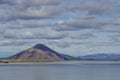 Valcano mount and lake in Myvatn Winter landscape