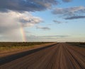 Rainbow, dirt road, Valdes Peninsula, Northern Patagonia, Argentina, South America Royalty Free Stock Photo