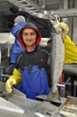 Valdez, Alaska. August 2011. Processing fresh salmon at a fish factory.