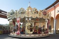 Valdichiana Outlet Village, Italy 09/17/2019: Colorful carousel to amuse children