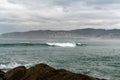 Surfing at A Frouxeira beach in Galicia in northern Spain Royalty Free Stock Photo