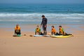 Vale Figueiras, Portugal - April 8, 2019: Surfers getting surfers lessons in Portugal
