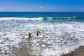 Aerial from surfers getting surfing lessons at Praia Vale Figueiras in Portugal