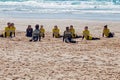 Surfers getting surfing lessons at Praia Vale Figueiras in Portugal