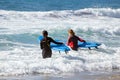 VALE FIGUEIRAS, PORTUGAL - MAY 13, 2017: Two surfers getting getting surf lessons in Portugal