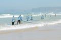 VALE FIGUEIRAS, PORTUGAL - Surfers getting surf classes