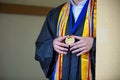Valedictorian Shows off Medal with Graduation Gown Royalty Free Stock Photo