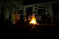 A priest is seen celebrating night mass around the Santa bonfire on Saturday night of Hallelujah. Holy week in Valenca, Bahia Royalty Free Stock Photo