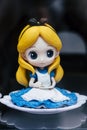 Valence, France - August 19, 2020 - Plastic figurine of Disney Princess Alice in Wonderland Royalty Free Stock Photo