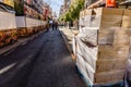 Valencia - March 16, 2019: A street empty with packages of merchandise to deliver for next night`s party Royalty Free Stock Photo