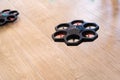 Valencia, Spain - April 3, 2019: Airblock Educational Drone for children flying inside a programming classroom