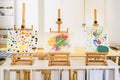 Valencia, Spain - April 4, 2019: Easels with watercolor paintings made by children in art class