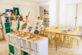 Valencia, Spain - April 4, 2019: Easels with watercolor paintings made by children in art class