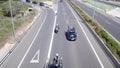 Valencia, Spain - April 18, 2021: Professional cycling race corresponding to the Volta to Valencia, last kilometers seen from abo
