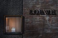 Valencia, Spain - August 20, 2020: Facade of the Loewe store with its stone logo, a store specializing in luxury handbags and