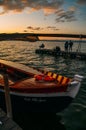 VALENCIA, SPAIN - Dec 03, 2020: Lovely Boat Parked During Beautiful Sunset in Albufera Lake with People Silhouette Background Royalty Free Stock Photo