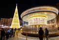 Valencia, Spain. December 2018: Christmas fair with carousel on Modernisme plaza of the city hall of Valencia, Spain.