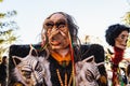Valencia, Spain - February 16, 2019: Man disguised as a shaman, traditional wizard of Peru