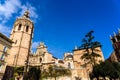 Valencia, Spain - February 24, 2019: Plaza de la Reina a sunny spring day during Fallas, with the Cathedral of Valencia and its Royalty Free Stock Photo