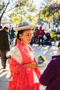 Valencia, Spain - February 16, 2019: Portrait of women wearing the traditional Bolivian party outfit during a carnival parade