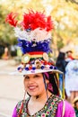 Valencia, Spain - February 16, 2019: Portrait of women wearing the traditional Bolivian party outfit during a carnival parade