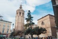 VALENCIA, SPAIN - FEBRUARY 3, 2016: A square in front of Miguelete tower and Metropolitan Cathedral - Basilica of the Assumption Royalty Free Stock Photo