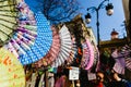 Valencia, Spain - February 24, 2019: Typical colorful Spanish flamenco fans for sale in a street market in spring