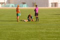 Valencia, Spain - January 14, 2019: Doctor attending injured rugby player Royalty Free Stock Photo