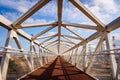 Valencia, Spain - July 30, 2019: Pedestrian bridge with modern geometric shapes in futuristic style