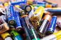 Valencia, Spain- July 24, 2019: Pile of old and used AA and AAA batteries, damaged and broken by acid, ready to send a clean