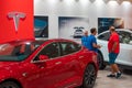 Two buyers of a Tesla Model S electric car on display at Valencian Tesla store Royalty Free Stock Photo