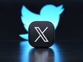 Valencia, Spain - July, 2023: X app logo in front of the Twitter blue bird symbol background in 3D rendering. X is the new name