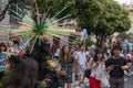 Valencia, Spain - June 16, 2018: a person with a costume takes photos with people on gay pride day