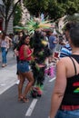 Valencia, Spain - June 16, 2018: a person with a costume takes photos with people on gay pride day