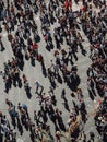 Valencia - Spain, March 17, 2019: Crowd of people through the streets of Valencia in Fallas Crowd of people walking the streets of