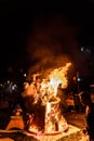 Detail of a Falla Valenciana burning between flames of fire