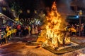 Valencia, Spain - March 19, 2019: Detail of a Falla Valenciana burning between flames of fire