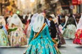 Valencia, Spain - March 17, 2019: Detail of the typical fallero dress, during the colorful and traditional parade of the offering Royalty Free Stock Photo