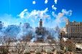 Columns of smoke from a mascleta, a typical daytime fireworks display during the Fallas of Valencia