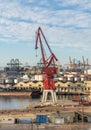 Older crane on dockside in Valencia harbor Royalty Free Stock Photo