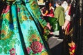 Valencia, Spain - March 17, 2019: Several of the thousands of women Falleras who parade down the street of La Paz with their