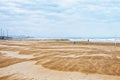 Valencia, Spain, March 24, 2022. Storm, bad weather on the beach of Malva Rosa, strong wind blew a lot of sand Royalty Free Stock Photo