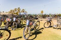 Valencia, Spain - May 12, 2019: Parking lot with many rental bicycles for tourists on the Malvarrosa beach of Valencia