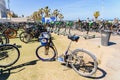 Valencia, Spain - May 12, 2019: Parking lot with many rental bicycles for tourists on the Malvarrosa beach of Valencia