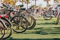 Valencia, Spain - May 12, 2019: Parking lot with many rental bicycles for tourists on the Malvarrosa beach of Valencia